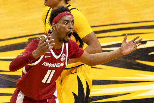 Smith leads Arkansas to overtime victory at Missouri