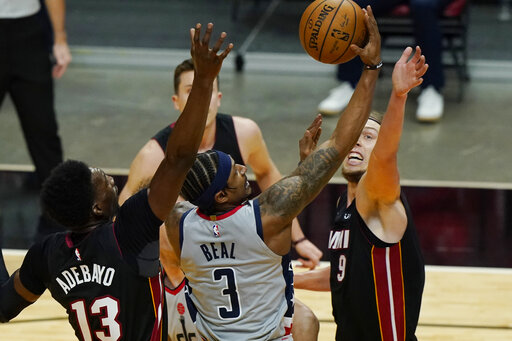 Beal starts 0 for 13, Heat roll past Wizards 122-95