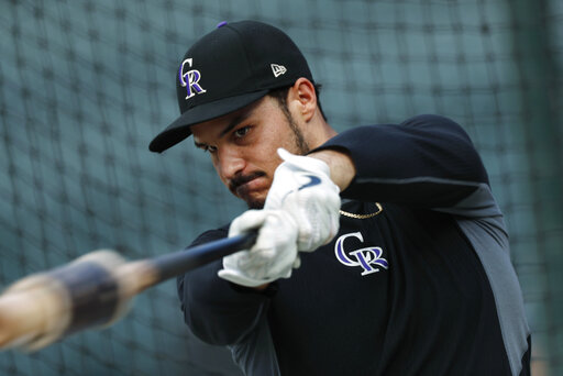 Arenado embraces playing for perennial contender in Cards