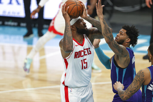 Ball, Hornets use strong 4th quarter to beat Rockets 119-94