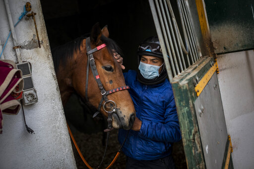AP PHOTOS: Madrid racetrack bets on riding out of pandemic