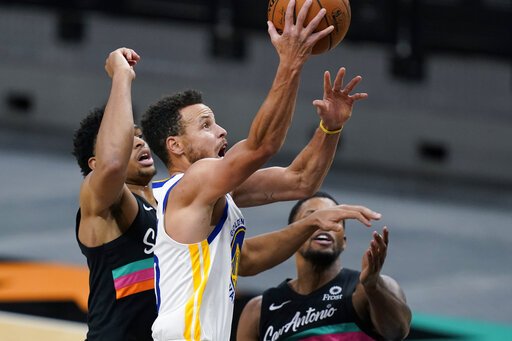 Curry leads Warriors to 114-91 victory, ending Spurs' streak